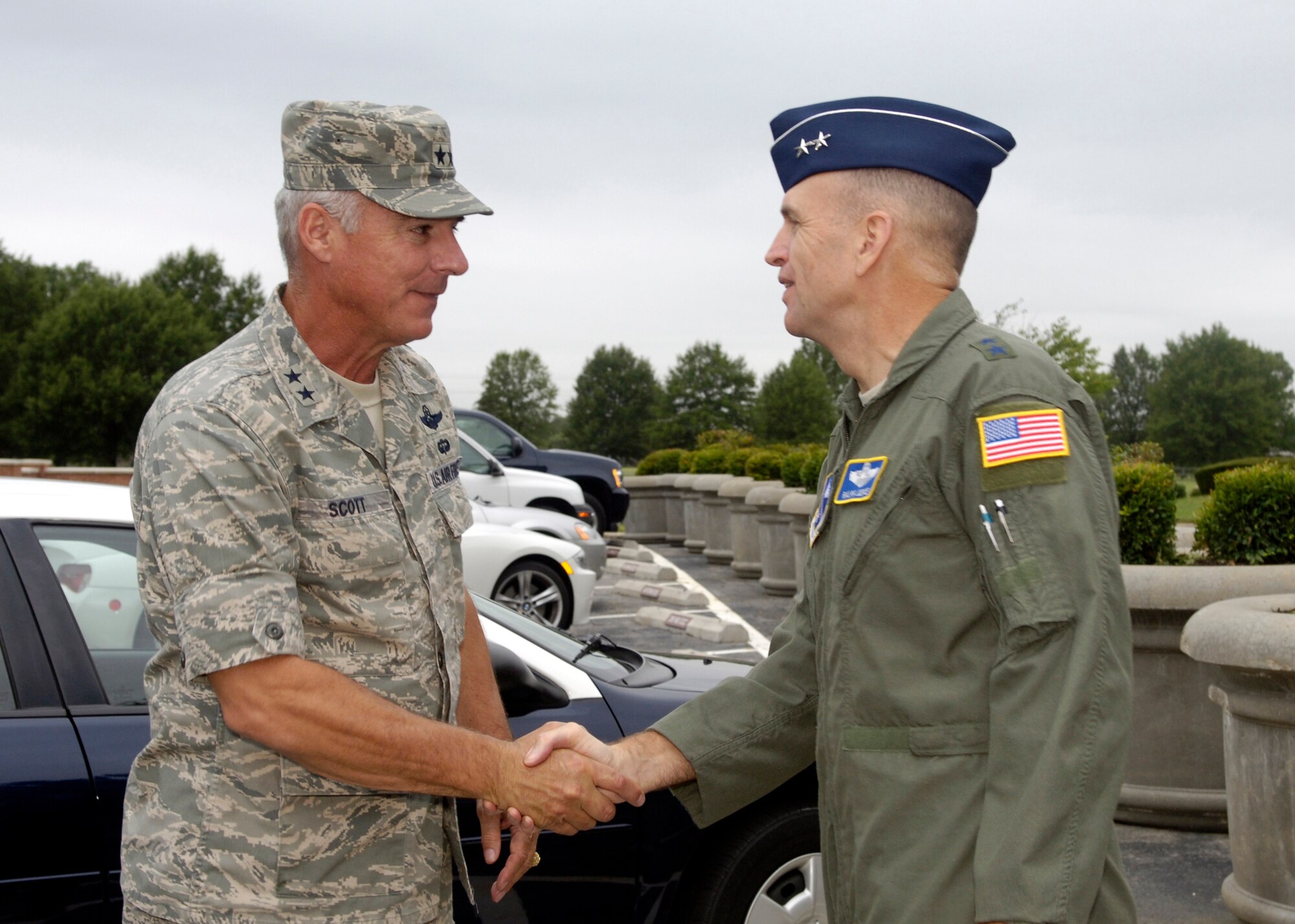 Maj. Gen. Ralph Jodice, right, Air Force District of Washington commander, greets Maj. Gen. Winfield W. Scott III, 18th Air Force commander, outside the Headquarters AFDW building Sept. 12.  General Scott, whose headquarters is at Scott Air Force Base, Ill., visited Andrews Air Force Base, Md., as a part of an initial mission brief from the 89th Airlift Wing.  The 89th AW is one of 12 Air Mobility Command wings for which 18th AF is responsible.  (U.S. Air Force photo by Senior Airman Renae Kleckner)