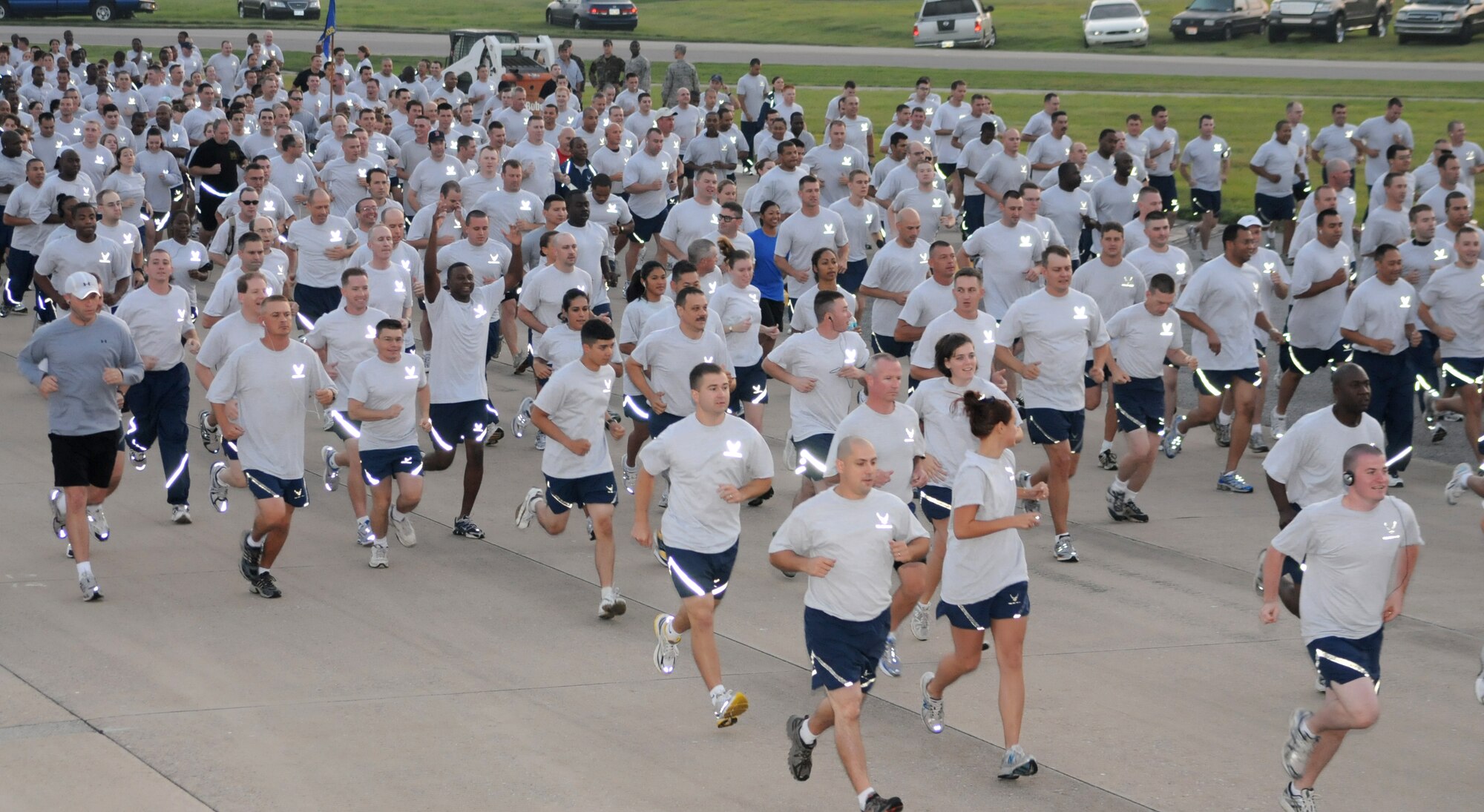 Hundreds of Keesler Airman participate in a 2-mile run on the flight line in celebration of the Air Force's 61st birthday.  (U.S. Air Force photo by Kemberly Groue)