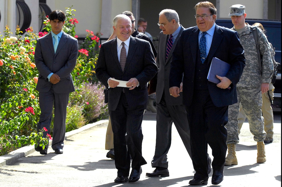 U.S. Defense Secretary Robert M. Gates walks with Afghani Defense Minister Wardak at the presidential palace in Kabul, Afghanistan, Sept. 17, 2008. 