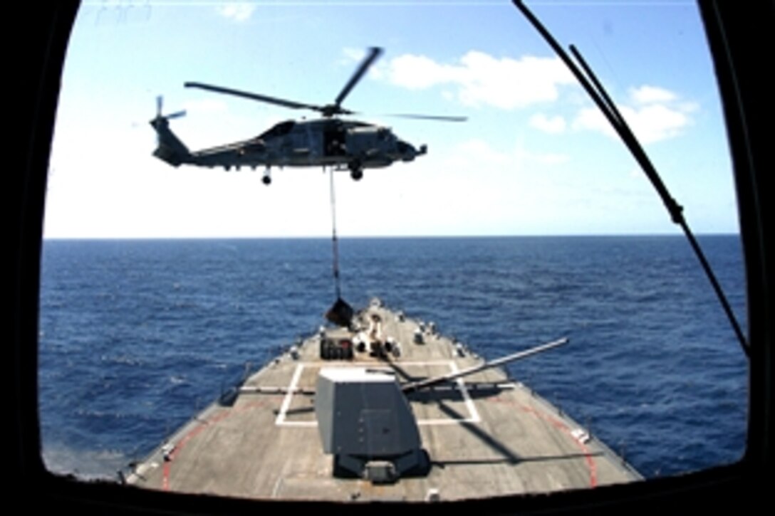 A Sea Hawk helicopter conducts a vertical replenishment on the USS Halsey  in the Indian Ocean, Sept. 10, 2008. USS Halsey is part of the Peleliu Expeditionary Strike Group deployed in the U.S. 5th Fleet area of responsibility supporting maritime security operations. 