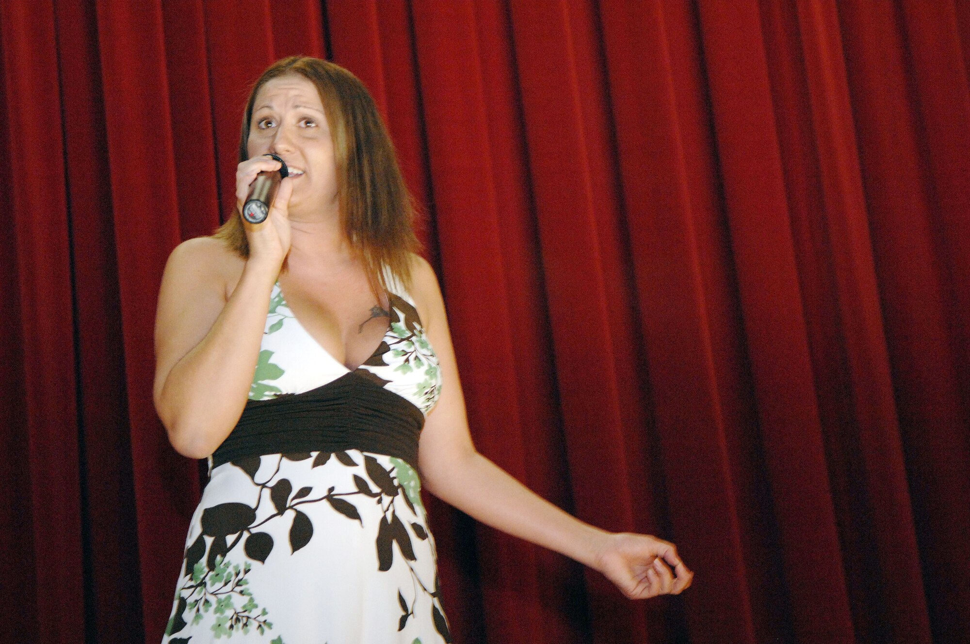 THE CONTESTANTS

MELODY PARMENTER
Singer

(U.S. Air Force photo)