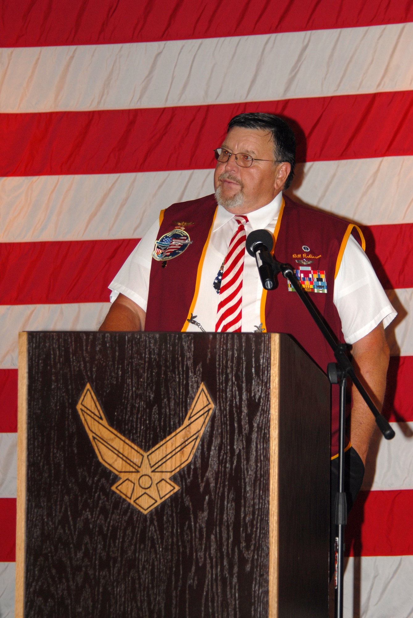 Retired Capt. Bill Robinson, longest held enlisted POW in American history, speaks at the National POW/MIA Recognition day luncheon held at the Touch and Go club here today.  (U.S. Air Force photo/Lisa Norman)