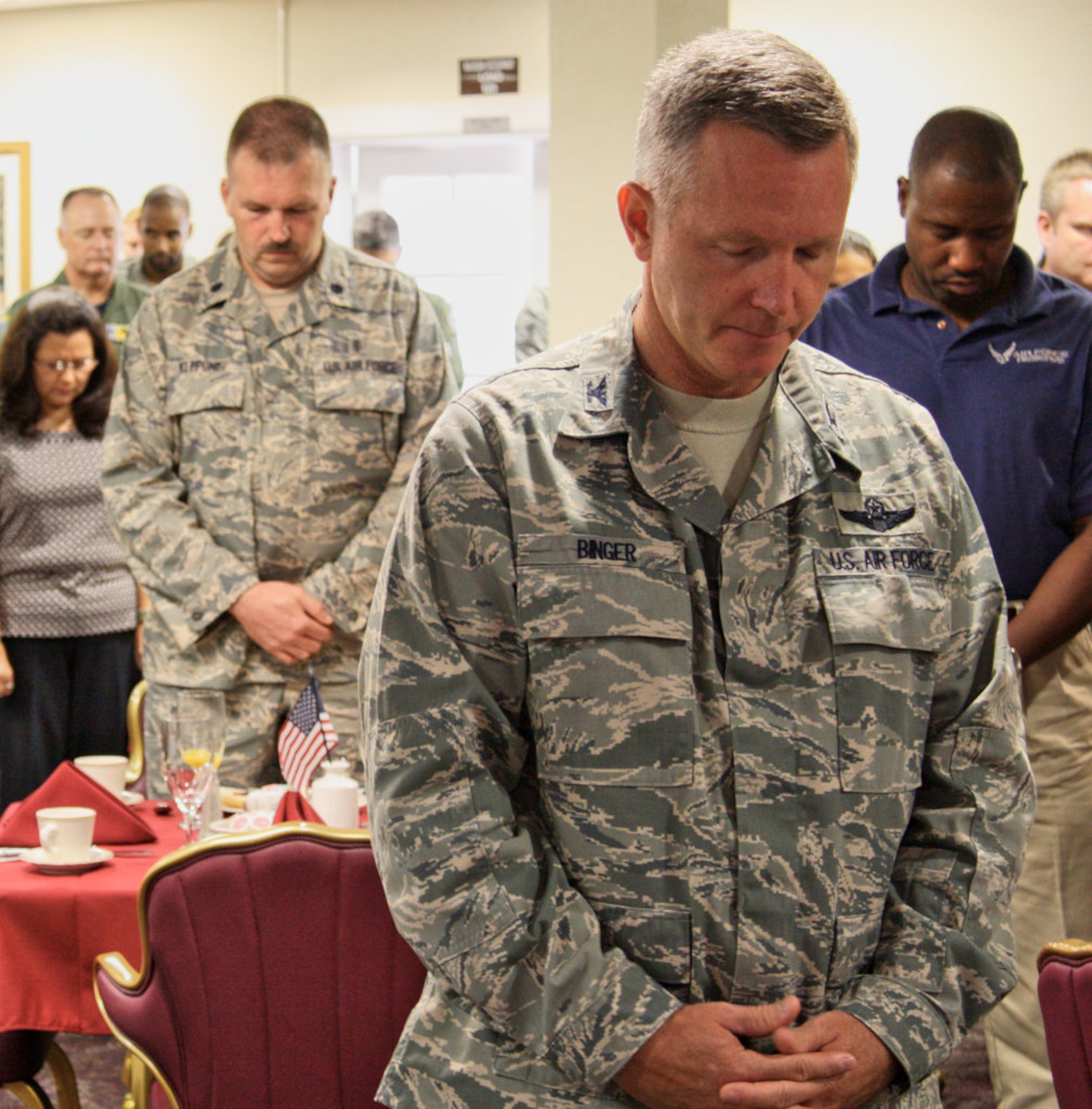Col. William B. Binger, 482nd Fighter Wing commander, bows his head during a ceremony in observance of National Prisoner of War/Missing in Action Recognition Day at Homestead Air Reserve Base Fla., on Sept. 19. Over 100 military and civilian personnel from units across the base and the local community attended the event. 

“We never leave anyone behind. Our warriors know this and deserve it" said Col. Binger. 

““We will make the observance breakfast an annual event to pay our respects and honor the brave servicemen who served their country under very difficult circumstances and to those who paid the ultimate price fighting for our freedom." Binger added. (U.S. Air Force photo/TSgt Lionel Castellano)