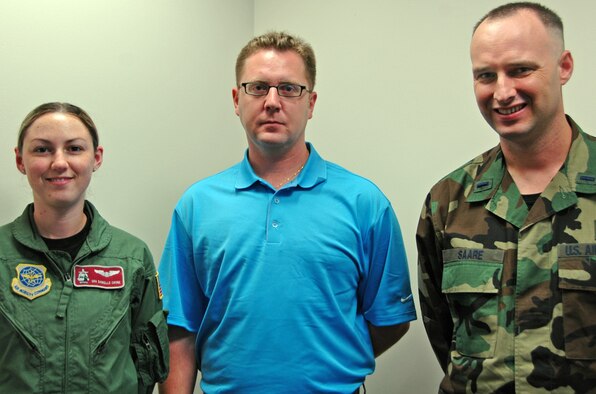 Three new Airmen joined the 931st Air Refueling Group family during the October Unit Training Assembly: (from left to right) Senior Airman Danielle Crone, Tech. Sgt. Bryan Pryor and Chaplain (1st Lt.) Keith Saare.