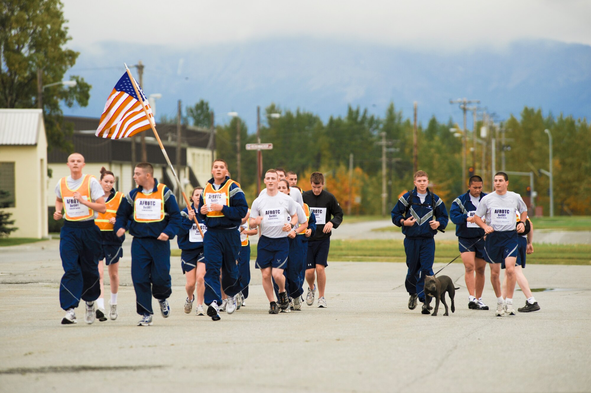 ELMENDORF AIR FORCE BASE Alaska?Air Force Cadets from the University of Alaska, Anchorage run their 9-11 run Sept. 13. The run was organized to show support of the Armed Forces fighting terrorism and in remembrance 9-11. The run lasted 24 hours with nearly 100 runners taking shifts of 30 minutes. (U.S. Air Force photo/Senior Airman Matthew Owens)