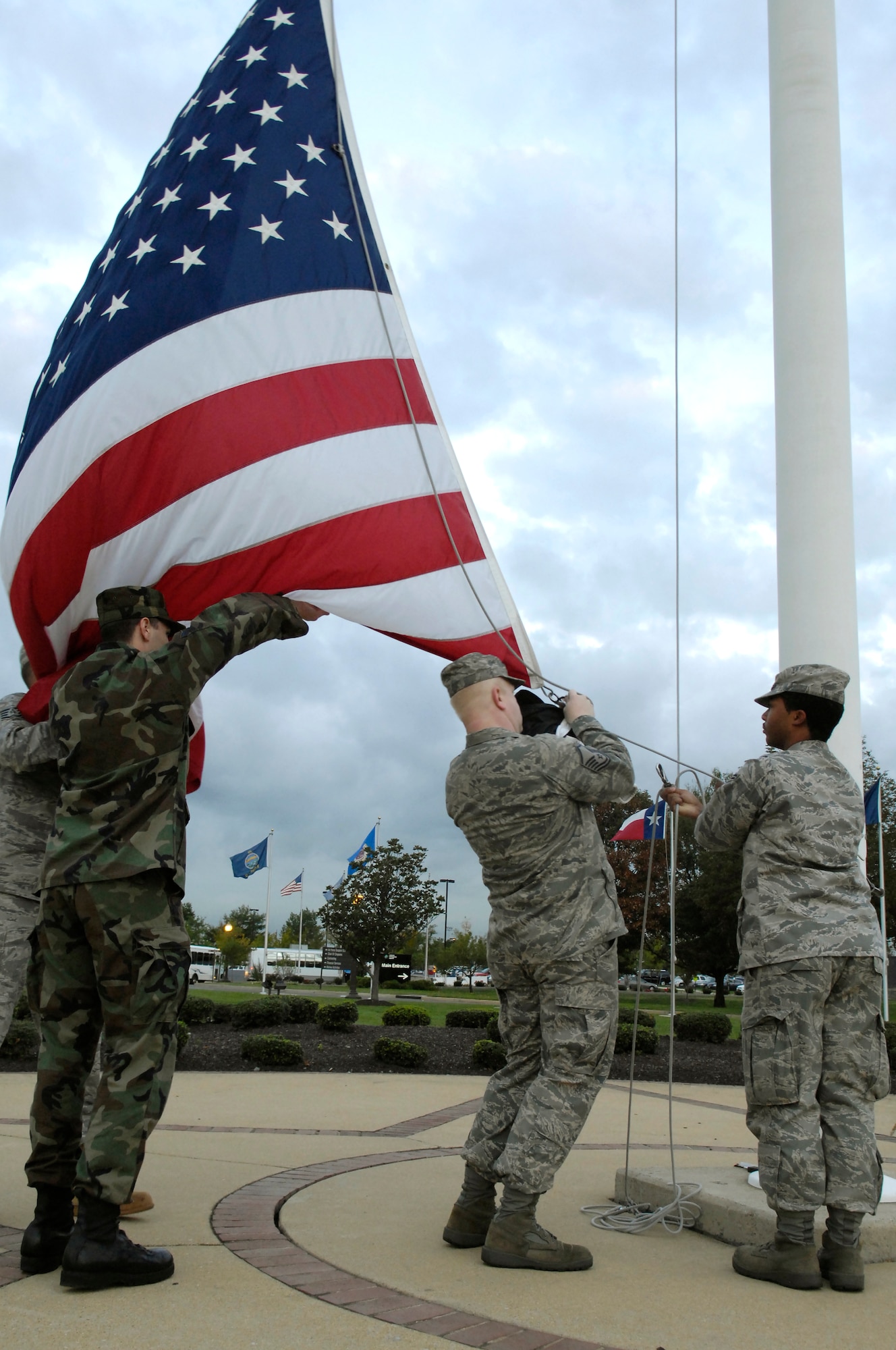 Airmen from the National Capital Region attach a POW/MIA flag Sept. 19 to the flagpole on Bolling. The flag was attached during a reveille ceremony as part of the National POW/MIA Day. (U.S. Air Force Photo by Senior Airman Dan DeCook)