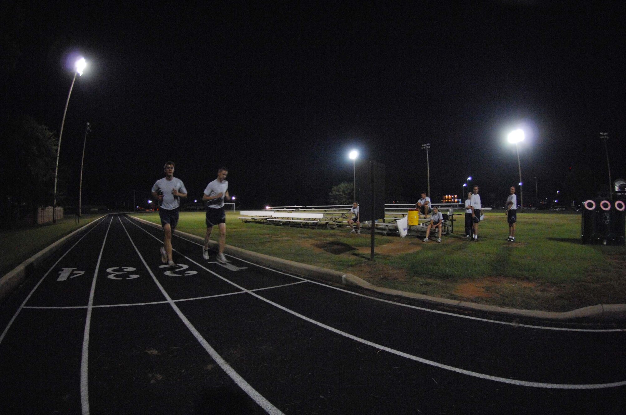 SHAW AIR FORCE BASE, S.C. -- Personnel from the 20th Fighter Wing run through the night as they pay tribute to POW/MIA members during the 24-hour Remembrance Run Sept. 18. Members volunteered their time to honor those who gave more of themselves than most. (U.S. Air Force photo/Staff Sgt. Patrick Mitchell)