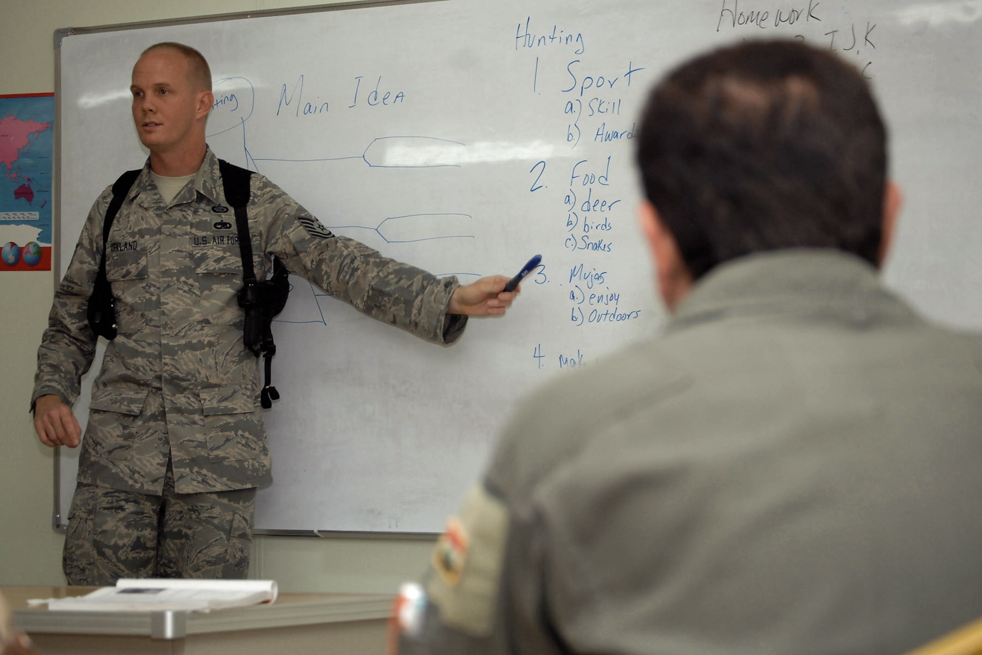 Tech. Sgt. Keith Kirkland teaches an English class to Iraqi airmen at Kirkuk Regional Air Base, Iraq, Sept. 8. The inaugural graduation ceremony for the American Language Course took place Sept. 10. Kirkland and his three-man team built the program to help the Iraqi air force achieve their fourth core value of learning the English language. Sergeant Kirkland is an instructor and NCO in charge of the ALC. (U.S. Air Force photo/Senior Airman Randi Flaugh) 
