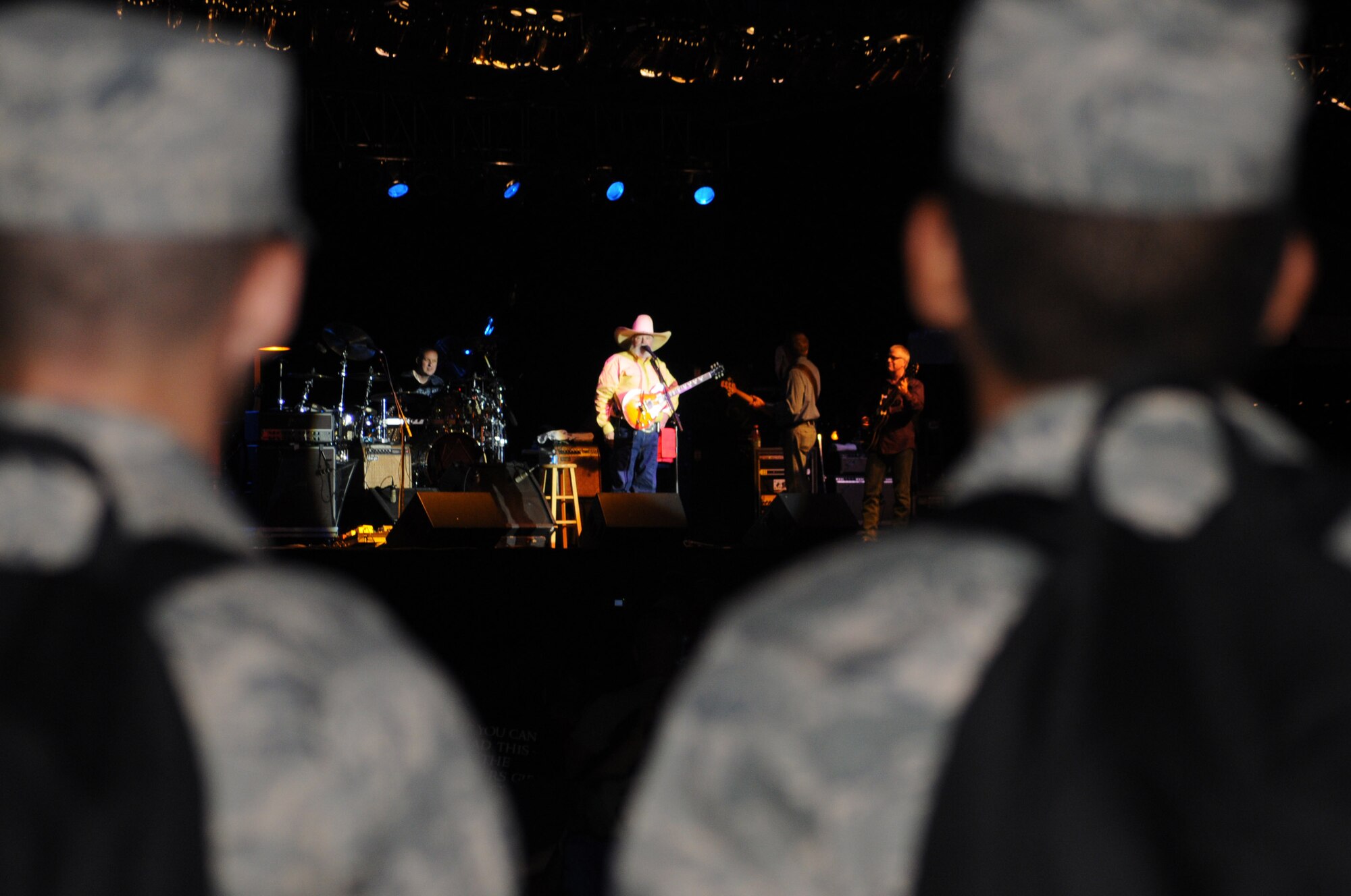 The Charlie Daniels Band is framed between two non-prior service students Sept. 18 while performing for Keesler Airmen, family, friends and local community members as part of the base's Air Force birthday celebration.  Prior to the concert, Mr. Daniels met with base leadership as well as several Airmen who earned Bronze Stars for their actions in Iraq. (U.S. Air Force photo by Kemberly Groue)