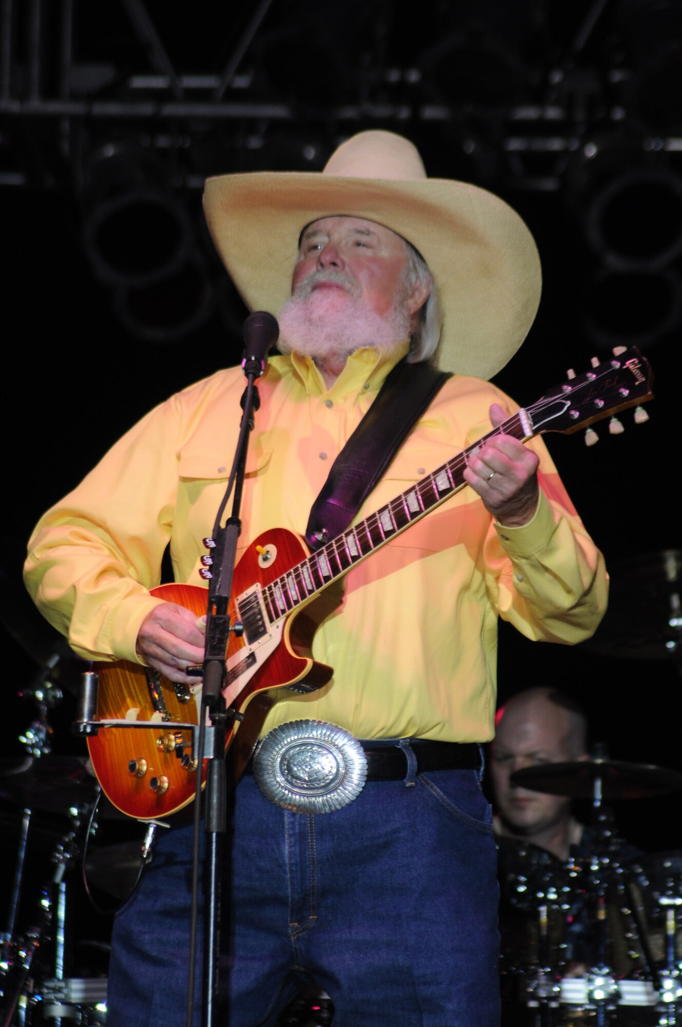 Charlie Daniels looks out to the crowd of Airmen, families and local community members Sept. 18 while performing a concert to help celebrate the Air Force's 61st birthday.  Prior to the concert, Mr. Daniels met with base leadership as well as several Airmen who earned Bronze Stars for their actions in Iraq. (U.S. Air Force photo by Kemberly Groue)