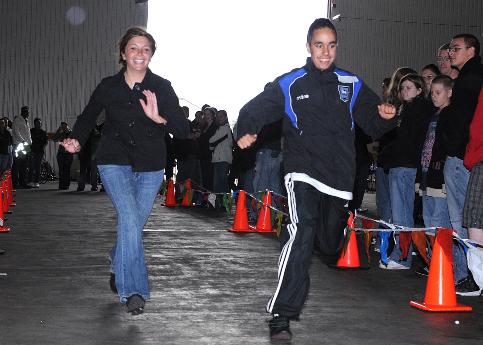 Staff Sergeant Ryan Martinek from the 100th Civil Engineering Squadron, tries to keep up with Craig Le’carpentier during a race at the 27th annual “Joan Mann Special Sports Day” event held at RAF Mildenhall, on Sept. 13, 2008. (U.S. Air Force photo by Staff Sergeant Jerry Fleshman)