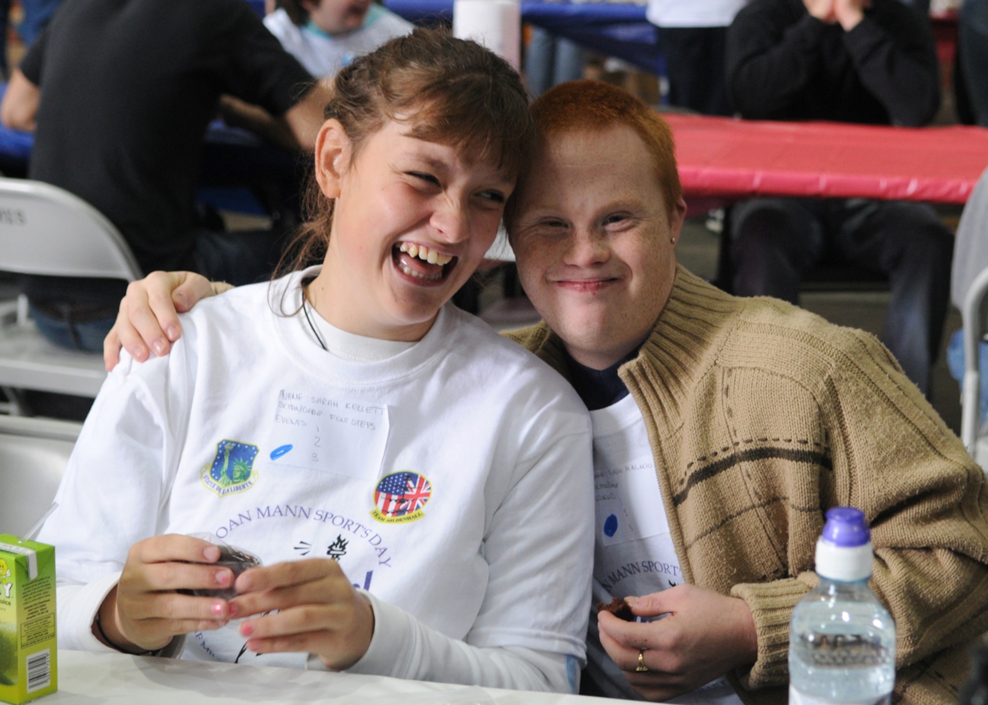 Sarah Kellett and Gavin Hamilton share a hug and some laughs at the 27th annual “Joan Mann Special Sports Day” event held at RAF Mildenhall, Sept. 13, 2008. (U.S. Air Force photo by Staff Sergeant Jerry Fleshman)