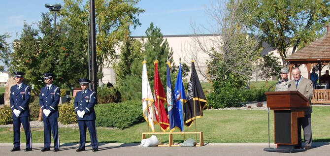 Col. (Ret.) Gary Schick, former commander of the 219th RED HORSE Squadron, speaks at the POW/MIA retreat ceremony at Medal of Honor park Sept. 17. (U.S. Air Force photo/Senior Airman Emerald Ralston))