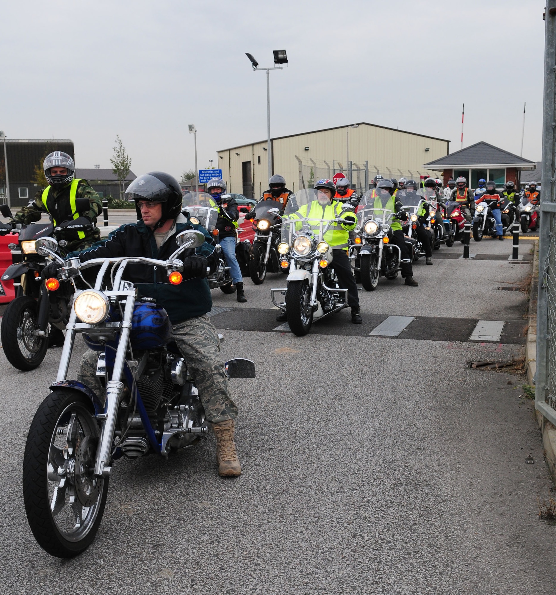 Fifty two motorcyclists take part in the Rolling Thunder motorcycle ride Sept. 16 between RAF Mildenhall and RAF Lakenheath. The riders also visited the war memorial in Mildenhall High Town, where Squadron Leader Rick Fryer, RAF Station commander, laid a wreath. The ride was in observance of POW/MIA Remembrance Week. (U.S. Air Force photo by Karen Abeyasekere)