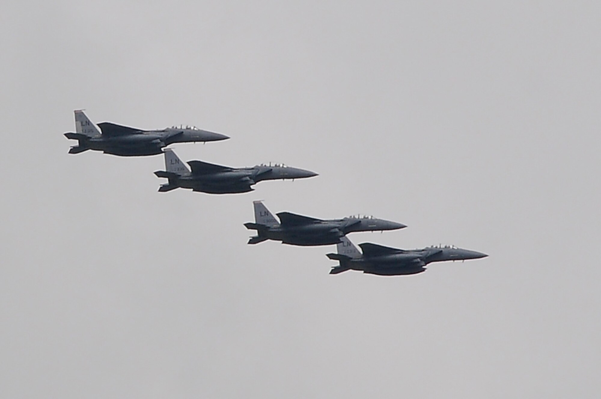 F-15 Strike Eagles fly over RAF Lakenheath, England on their way back from Southwest Asia in support of Operation Enduring Freedom, Sep 8. The F-15's and their aircrews, from the 494th Fighter Squadron, returned home. (U.S. Air Force photo by Senior Airman Brian J. Ellis)