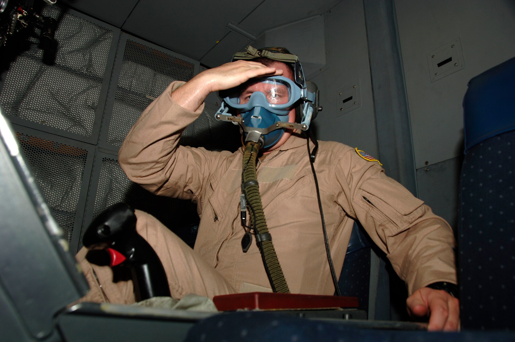SOUTHWEST ASIA -- Staff Sgt. Justin Taydus from the 908th Expeditionary Air Refueling Squadron test his oxygen mask during Air Refeuling Operators station preflight checks here Sept. 16. The 908th EARS fly numerous refueling sorties in direct support of the war on terrorism in Southwest Asia. Sergeant Taydus is deployed from the 32nd ARS, McGuire Air Force Base, N.J. His hometown is Myrtle Beach, S.C. (U.S. Air Force photo/Tech. Sgt. Christopher A. Campbell)(released)