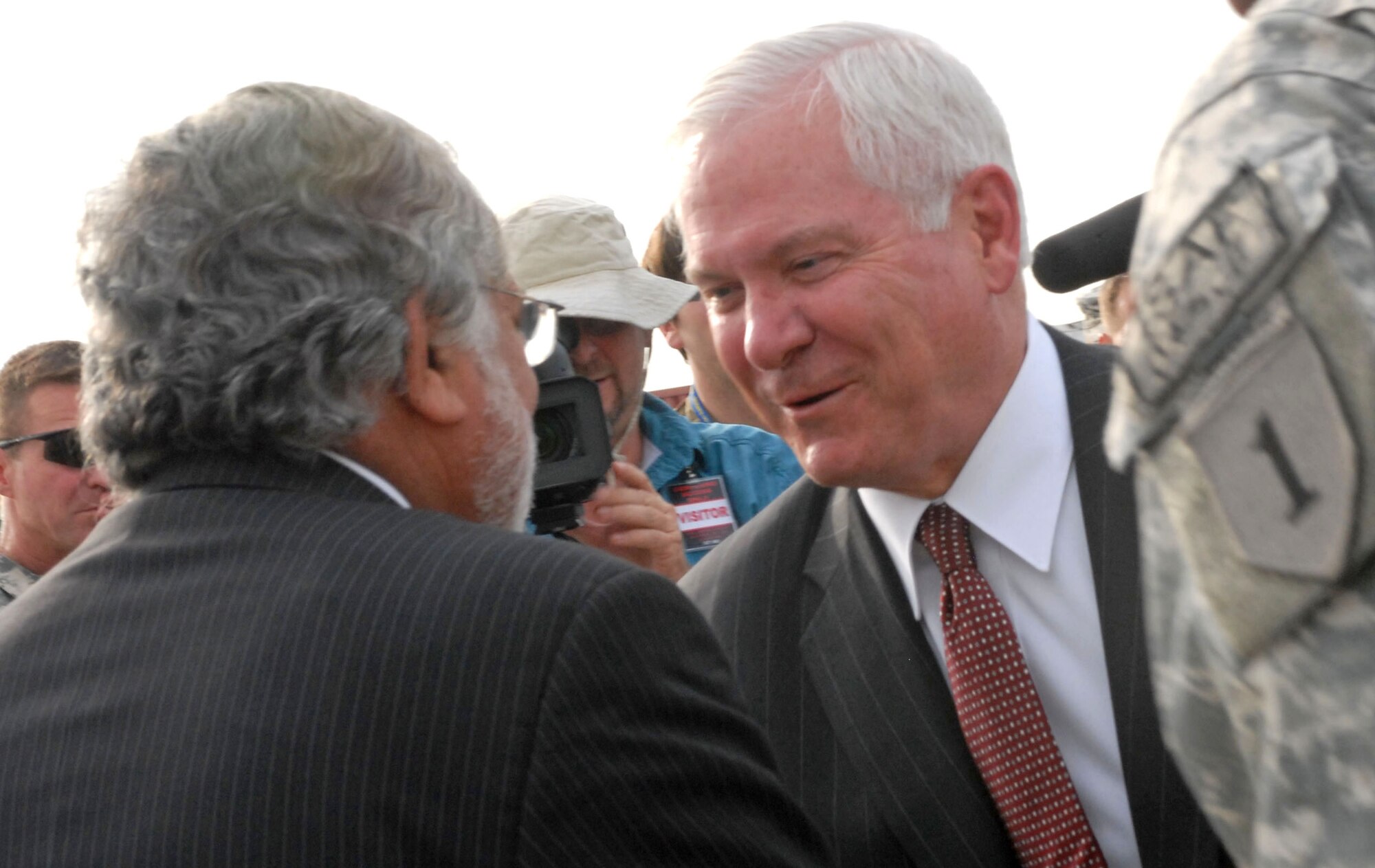 Secretary of Defense Robert M. Gates, greets the Konar’s provincial governor, Sayed Fazullah Wahidi, at  Jalalabad Airfield, Sept. 17. (U.S. Army photo/ Staff Sgt. Adora Medina)