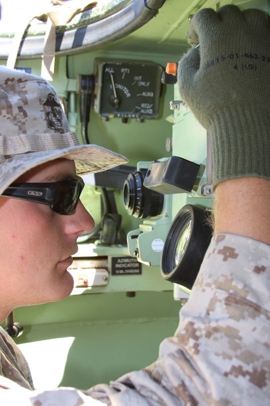 Lance Cpl. Randy Wilde, an LAV gunner with Company D and a native of Seminole, Okla., looks through the thermal sights in his new sight system recently installed in the LAV.  Improvements were also made to the LAV turret systems, the former hydraulic system was replaced with new Electric Drive Turrets.