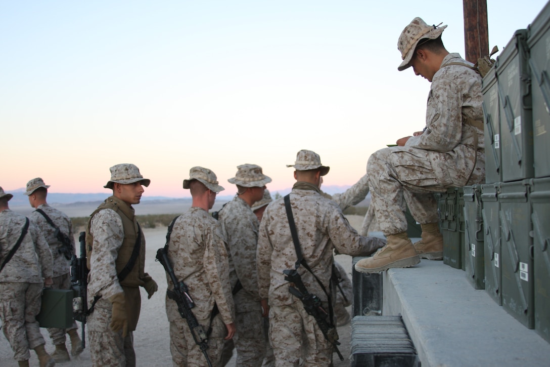 Marines with Company D, 3rd Light Armored Reconnaissance Battalion collect their 25 mm rounds before heading out to the firing line.  3rd LAR  recently received Improved thermal Sight Systems and Electric Drive Turrets in their light armored vehicles.