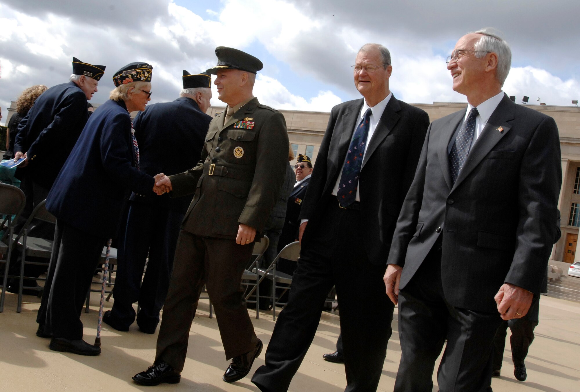 Marine Gen. James E. Cartwright, vice chairman of the Joint Chiefs of Staff, shakes hands with Doris Jones of American Legion Post 70 at the Armed Forces Retirement Home, Washington, D.C. at the National POW/MIA Recognition Day ceremony at the Pentagon, Sept. 19. (Defense Dept. photo/Fred W. Baker III) 