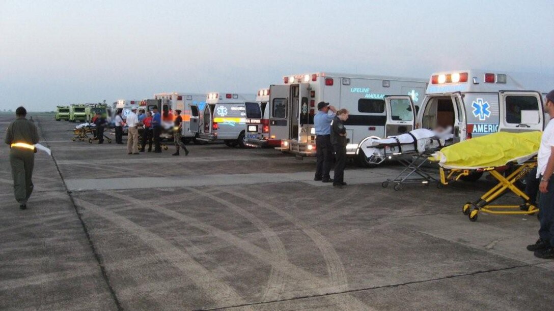 Patients await transport after Hurricane Gustav hit 
southern Louisiana as Staff Sgt. David Counts and Lt. Col. 
Melanie Jescavage prepared to fly.  Photo submitted.