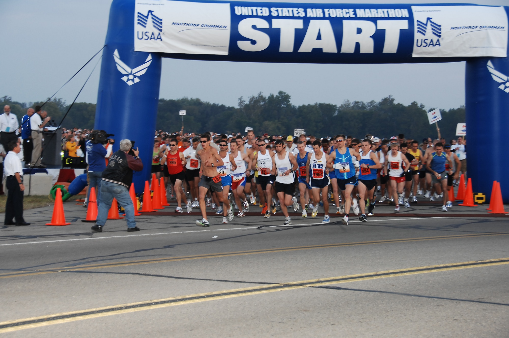 A record field of runners take off to start the 12th Annual U.S. Air Force Marathon at Wright-Patterson AFB, Ohio. Nearly 7,400 people registered to take part in the marathon events this year. (U.S. Air Force photo/Ben Strasser) 