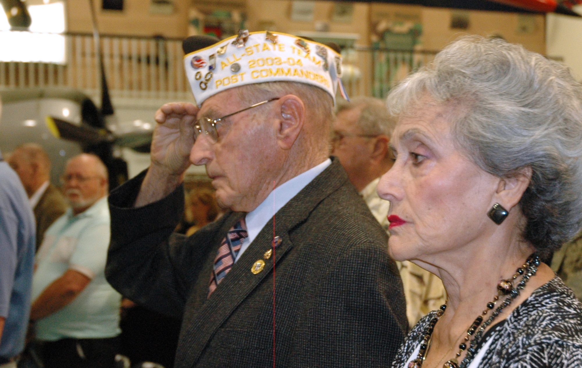 EGLIN AIR FORCE BASE, Fla. -- A Veteran proudly salutes the American flag as the Star Spangled Banner plays during the POW/MIA Ceremony Sept. 19 at the Air Force Armament Museum. (U.S. Air Force photo/Staff Sgt. Stacia Zachary)