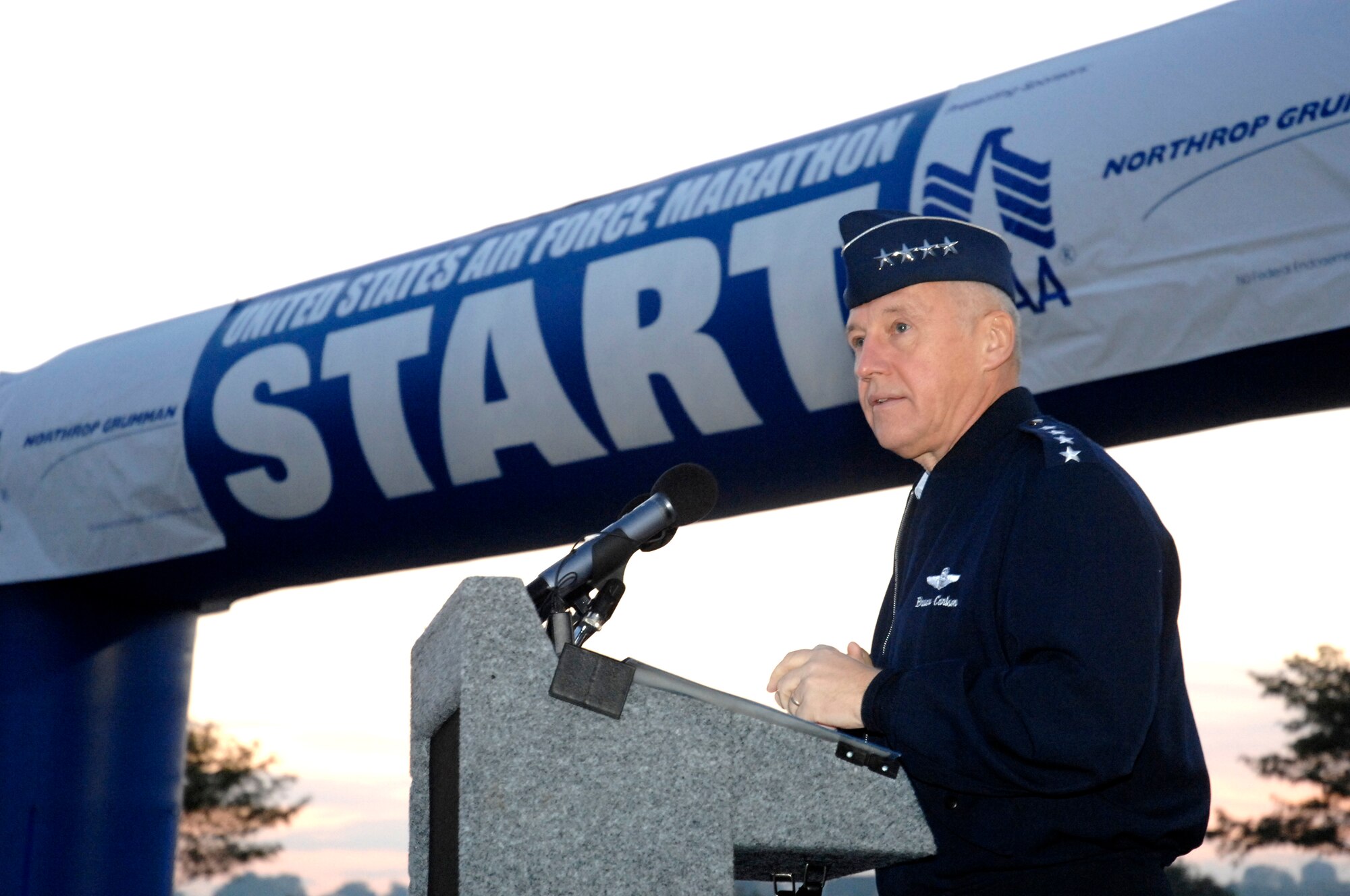 Gen. Bruce Carlson, Air Force Materiel Command commander, welcomed participants to the U.S. Air Force Marathon as the sunrises Sept. 20 at Wright-Patterson Air Force Base, Ohio.  A record field of nearly 7,400 runners took part in Air Force Marathon events. (U.S. Air Force photo/Al Bright)