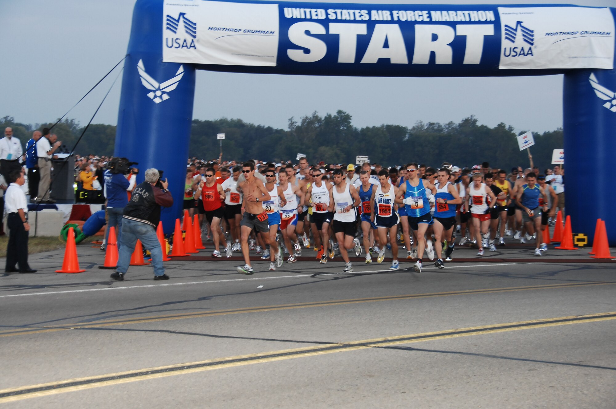A record field of runners take off to start the 12th Annual U.S. Air Force Marathon at Wright-Patterson AFB, Ohio.  Nearly 7,400 people registered to take part in the marathon events this year.  (U.S. Air Force photo by Ben Strasser)  