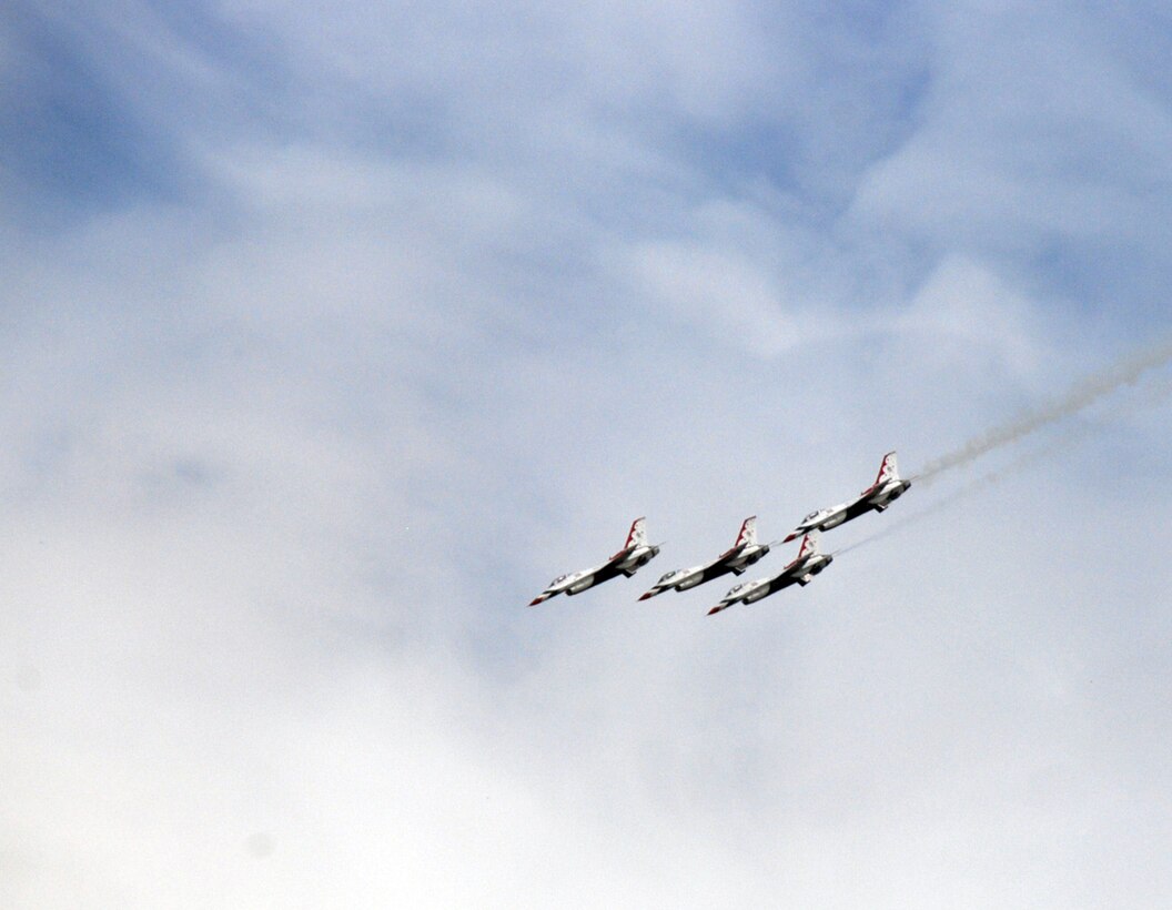 The U.S. Air Force Thunderbirds team flies over the 932nd Airlift Wing and all of Scott Air Force Base.  Photo by Tech. Sgt. Gerald Sonnenberg