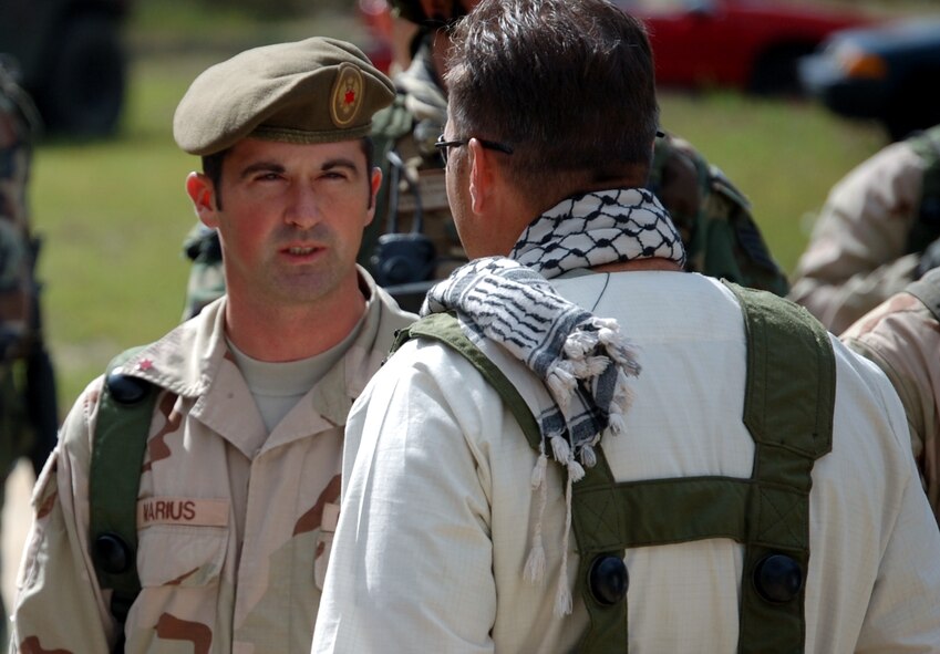 The role player for host nation commander "Colonel Marius" participates in a scenario for Air Force Exercise Eagle Flag 08-6 Sept. 19, 2008, at Naval Air Engineering Station Lakehurst, N.J.  The exercise is managed by the Center's 421st CTS and tests and trains Airmen in expeditionary combat support skills. (U.S. Air Force Photo/Tech. Sgt. Scott T. Sturkol)