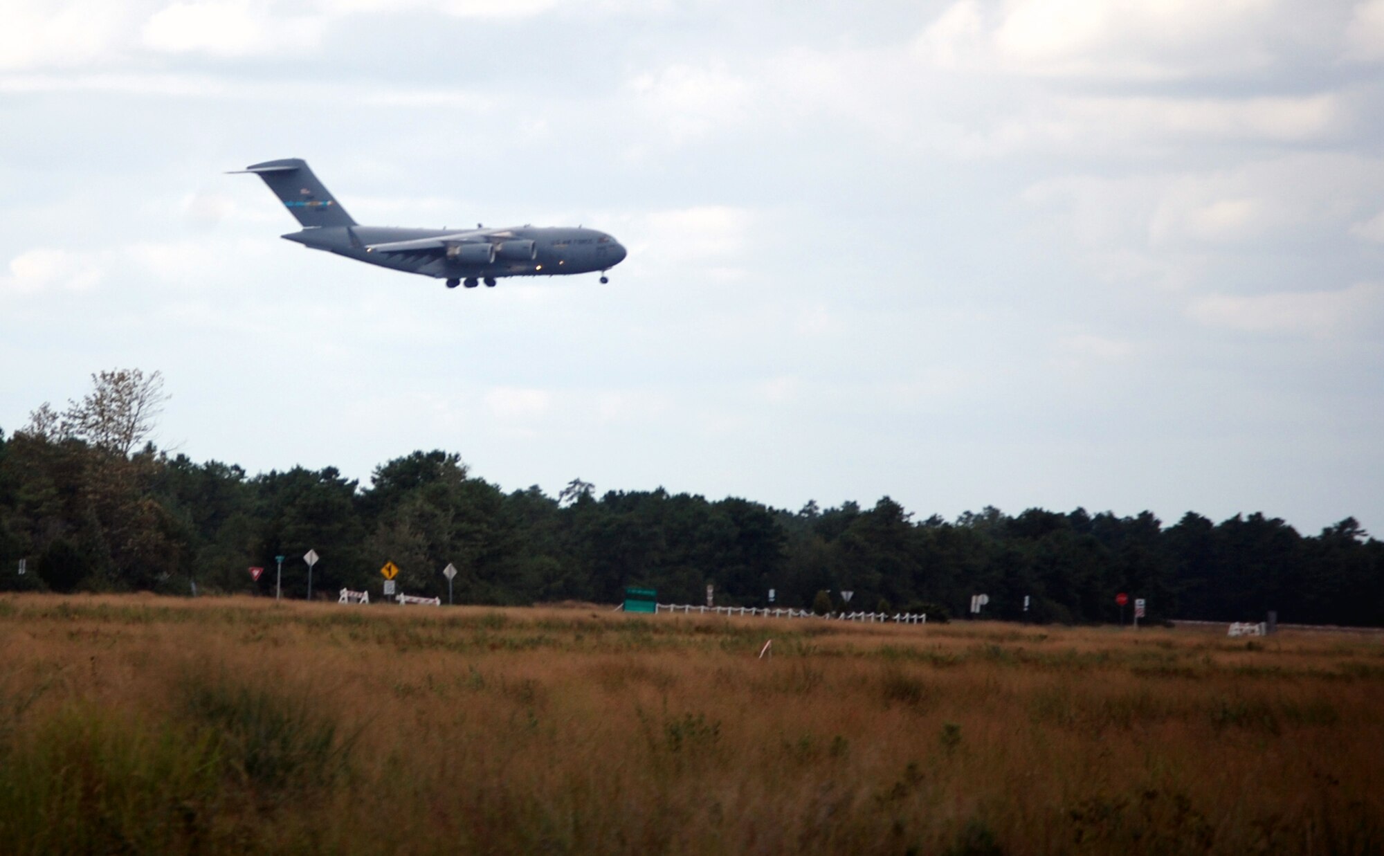 A C-17 Globemaster III from McGuire Air Force Base, N.J., comes in for a landing at Naval Air Engineering Station Lakehurst, N.J., as part of a scenario for Air Force Exercise Eagle Flag 08-6 Sept. 19, 2008.  The exercise, managed by the U.S. Air Force Expeditionary Center's 421st Combat Training Squadron from Fort Dix, N.J., tests and trains more than 400 Airmen in expeditionary combat support skills.  (U.S. Air Force Photo/Tech. Sgt. Scott T. Sturkol)