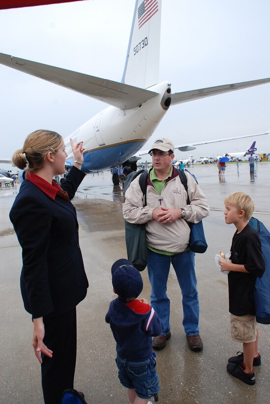 932nd Airlift Wing flight attendants told the story of the mighty C-40C distinguished visitor plane at the Scott Air Force Base 2008 Airshow.  Even with some rain, families from surrounding towns came to the Belleville area to see the planes and people.    The C-40C belongs to the Air Force Reserve Command, 932nd Airlift Wing at Scott.(U.S. Air Force photo by Gerald Sonnenberg)
