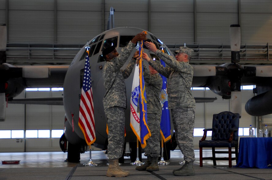 United States Army Gen. William E. Ward, Commander, U.S. Africa Command and U.S. Air Force Maj. Gen. Ronald R. Ladnier unfurl the 17th Air Force guide-on during an assumption of command ceremony, Ramstein Air Base, Germany, Sept. 18, 2008. Maj. Gen. Ladnier is assuming command of the United States Air Forces in Europe, 17th Air Force, Air Component to U.S. Africa Command. (U.S. Air Force photo by Airman 1st Class Kenny Holston)(Released)