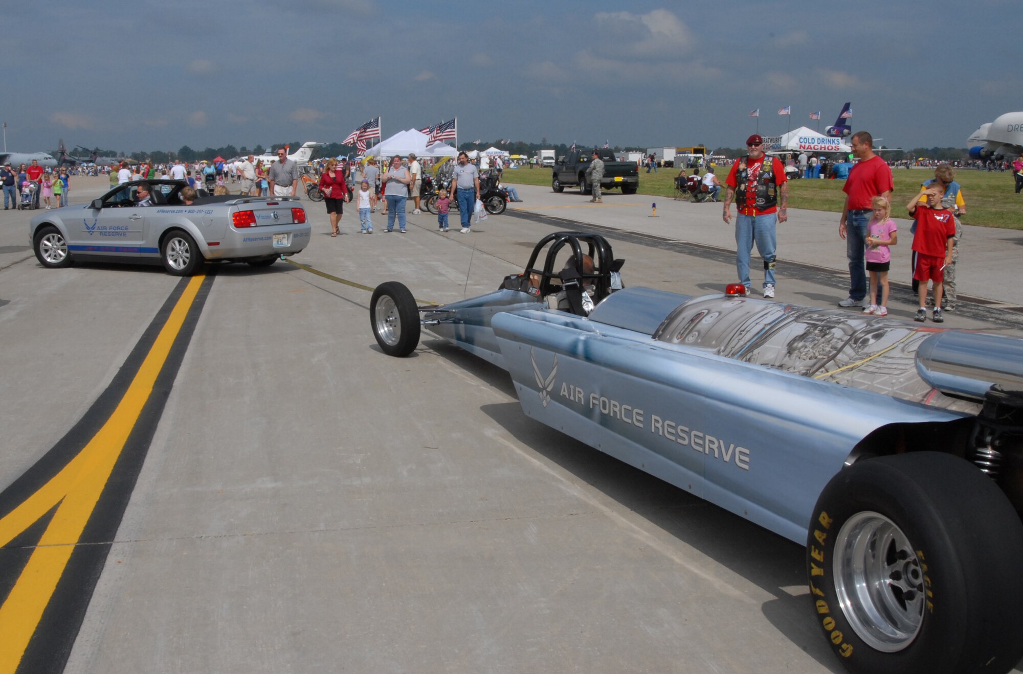 The Air Force Reserve Command Jet Car gets towed into position before demonstrating the awesome horsepower of the jet engine which propels it to over 400 miles per hour.  AFRC and the 932nd Airlift Wing participated in the Airshow 2008 at Scott Air Force Base, Ill.  (U.S. Air Force photo by Tech Sgt. Gerald Sonnenberg)