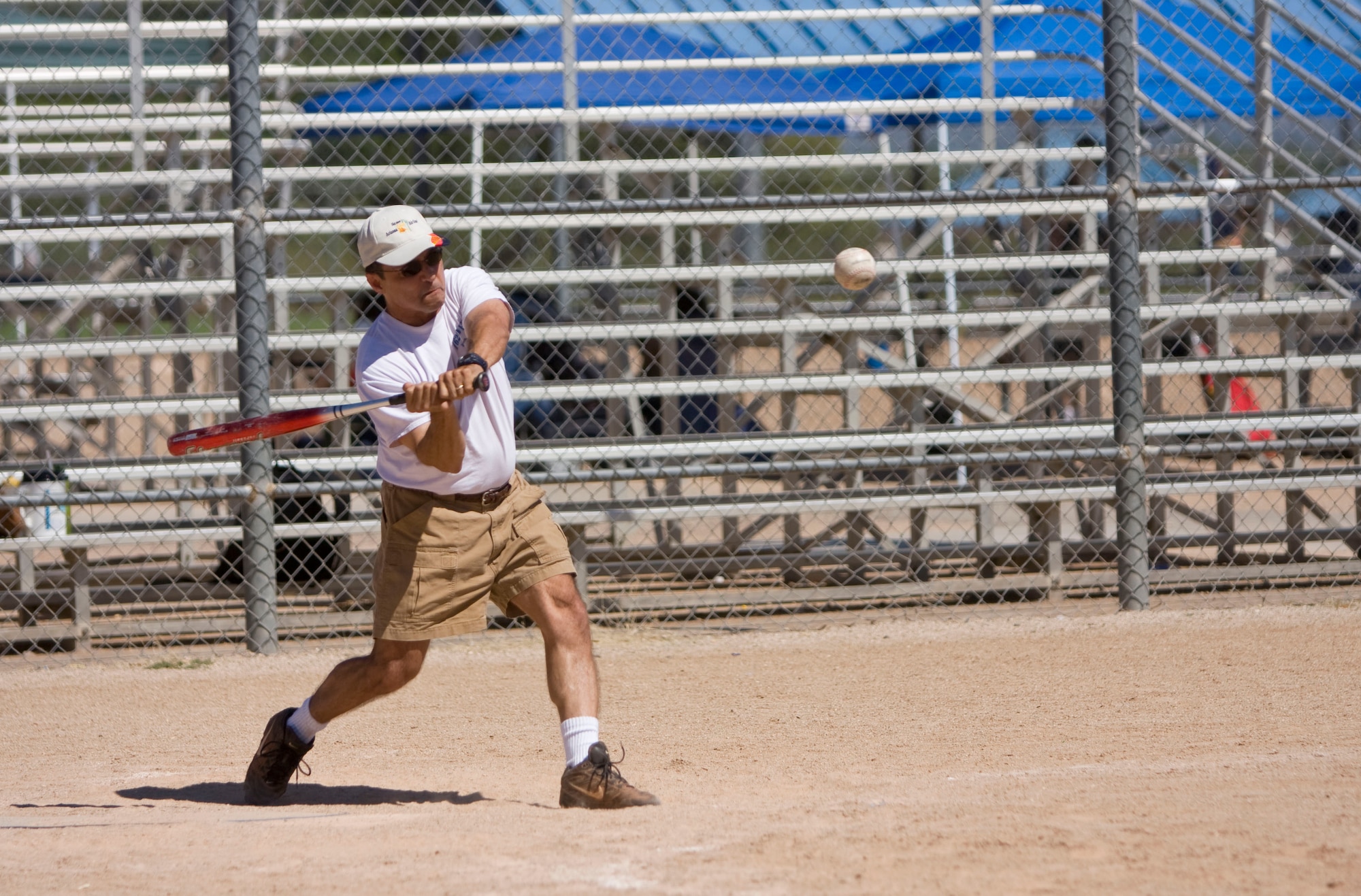 Col. Jose Salinas, wing vice commander, swings away at a pitch during the Junior Enlisted Council's 2008 Softball Tournament here Sept. 20. (Air National Guard photo by Tech. Sgt. Hollie Hansen)