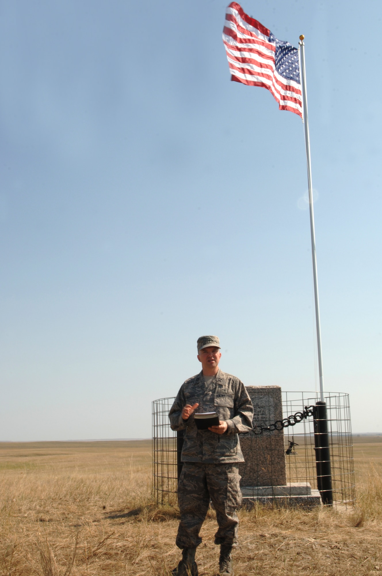 Capt. Jeff Granger, 28th Bomb Wing chaplin, welcomes those who came to the Fury II Memorial site, Sept. 19. Chaplin Granger also delivered an invocation, meditation and benediction during the wreath-laying ceremony.
(U.S. Air Force photo/Senior Airman Kasey Zickmund)