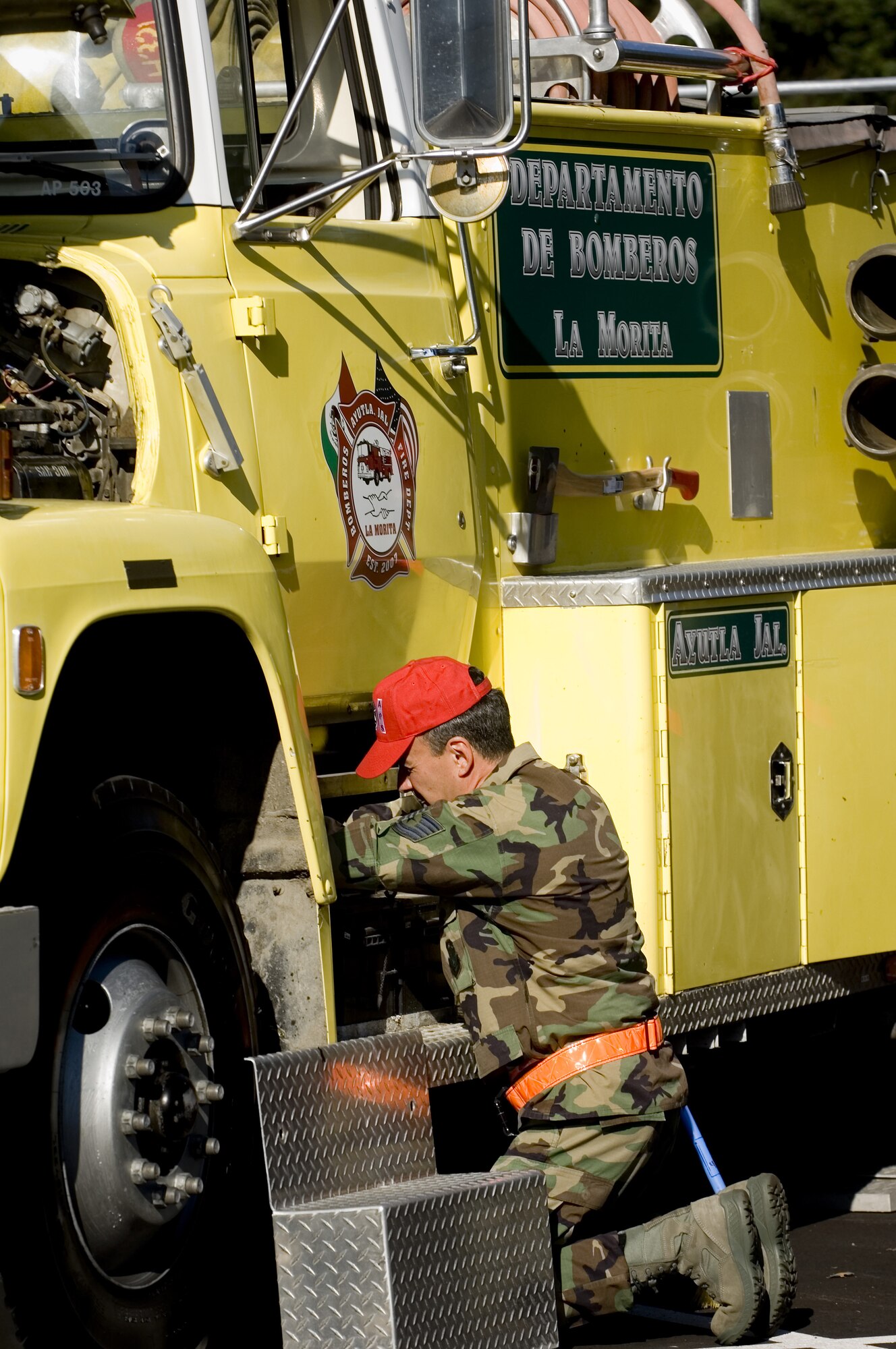 Tech Sgt. Dirk Gillespie, 86th Aerial Port Squadron, McChord Air Force Base, Wash., prepares a fire truck for a joint inspection before it can be loaded onto a C-17.  The fire truck, along with pallets of rescue equipment, was flown by Air Force Reserve aircrews here to Guadalajara, Mexico on Sept. 19.  Using the Denton Amendment, three local non-profit agencies worked with the 446th Airlift Wing for more than one year to secure the cargo's transportation to Mexico.  (U.S. Air Force photo/Abner Guzman)