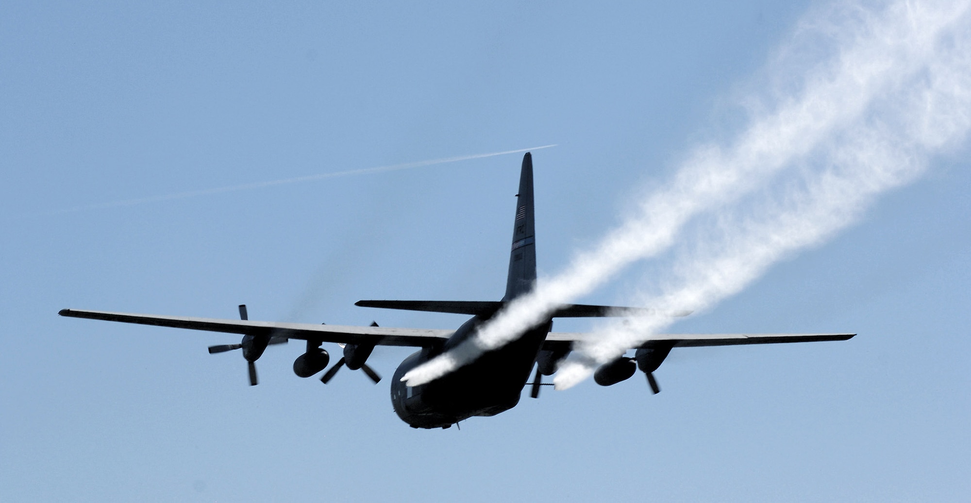 A C-130 Hercules aircraft from the 910th Airlift Wing, Youngstown Air Reserve Station, Ohio, will continue spraying mosquito pesticide over several Louisiana parishes Sept. 22 in the wake of heavy rainfall and flodding brought on by Hurricane Ike. (U.S. Air Force photo/Airman 1st Class Chad Kellum)