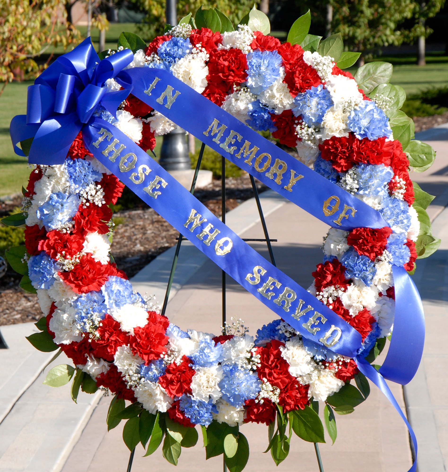 A POW/MIA wreath stands in remembrance Sept. 18 at the Peterson Air Force Base Museum in Colorado. The wreath was displayed during the day's retreat ceremony in memory of servicemembers who were prisoner of wars or those missing in action. The event was used as a forum to inform personnel about POW/MIA Remembrance Week on the base, which ran Sept. 15-19. POW/MIA week allowed members of the installation to remember those held prisoner of war and those missing in action during times of conflict. (U.S. Air Force photo/Craig Denton)
