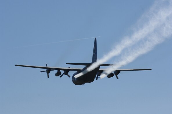 C-130 aircraft from the 910th Airlift Wing, Youngstown Air Reserve Station, Ohio, continue spraying mosquito pesticide over several Southern Louisiana parishes Sept. 22 in the wake of heavy rainfall and flooding brought on by Hurricanes Gustav and Ike. (Air Force file photo/Airman 1st Class Chad Kellum) 
