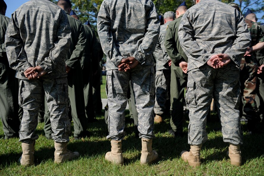 MOODY AIR FORCE BASE, Ga. – Members of Team Moody bow their heads while at parade rest during an invocation given by Chaplain Fowler at the National Prisoner of War/Missing in Action Remembrance Day ceremony here Sept. 19. President George W. Bush proclaimed Sept. 19 as national POW/MIA recognition day. (U.S. Air Force photo by Senior Airman Gina Chiaverotti)