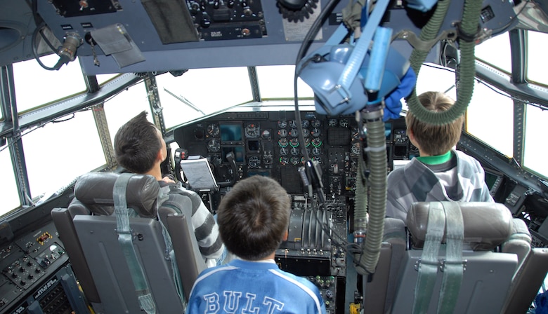 Students in Greenland check out the cockpit of a 109th Airlift Wing LC-130. The tour was part of a community day 109th AW members organized for the elementary school. (U.S. Air Force photo by Master Sgt. Christine Wood)