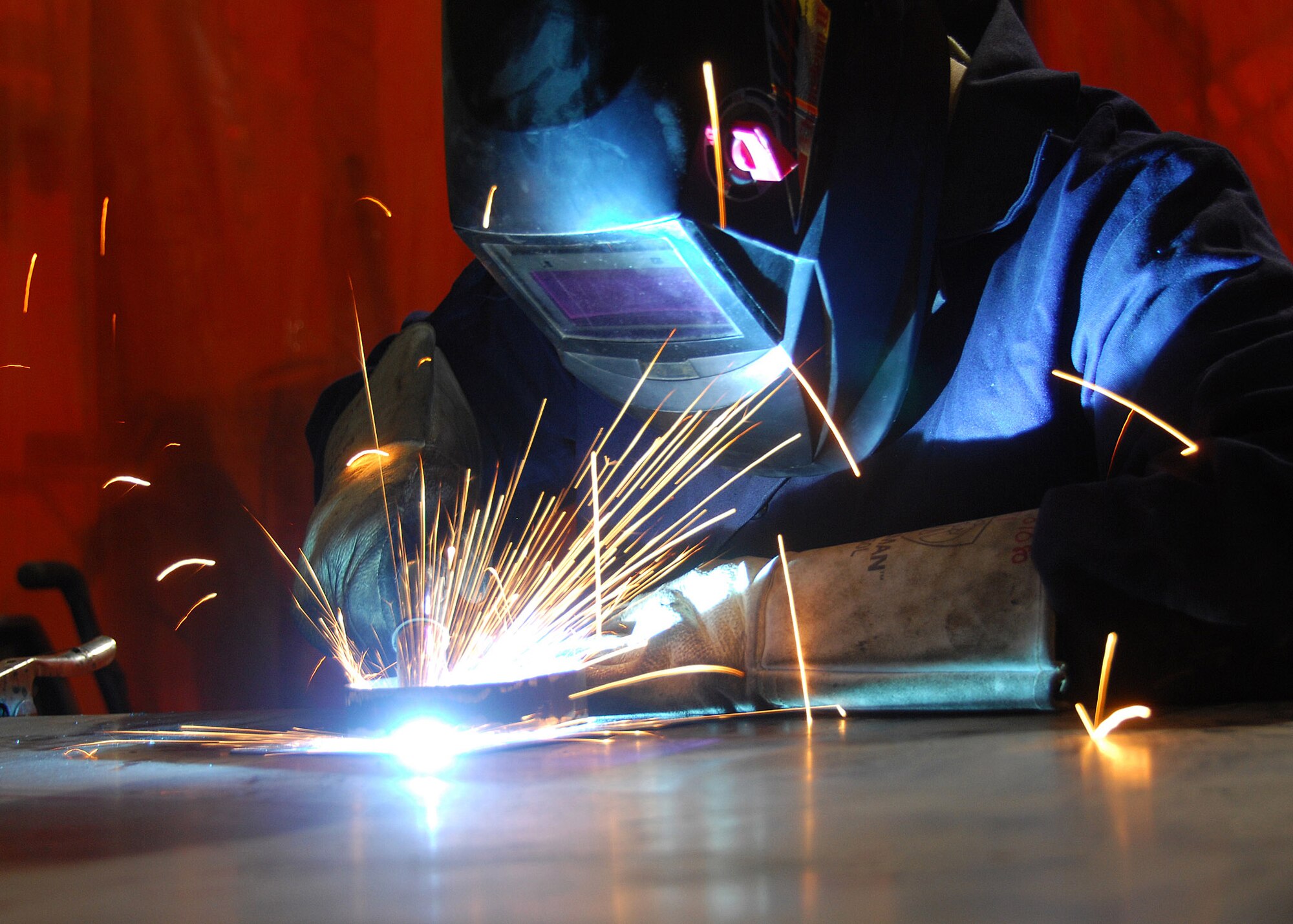 Senior Airman Timothy Jeffers welds pieces of a fuel probe mounting bracket together for a C-130 Hercules Sept. 17 at an air base in Southwest Asia. Members of the combat metals shop perform aircraft sheet metal fabrication, structural repairs and modifications for aircraft. Airman Jeffers is assigned to the 386th Expeditionary Maintenance Squadron combat metals section and deployed from Davis-Monthan Air Force Base, Ariz. (U.S. Air Force photo/Tech. Sgt. Raheem Moore) 
