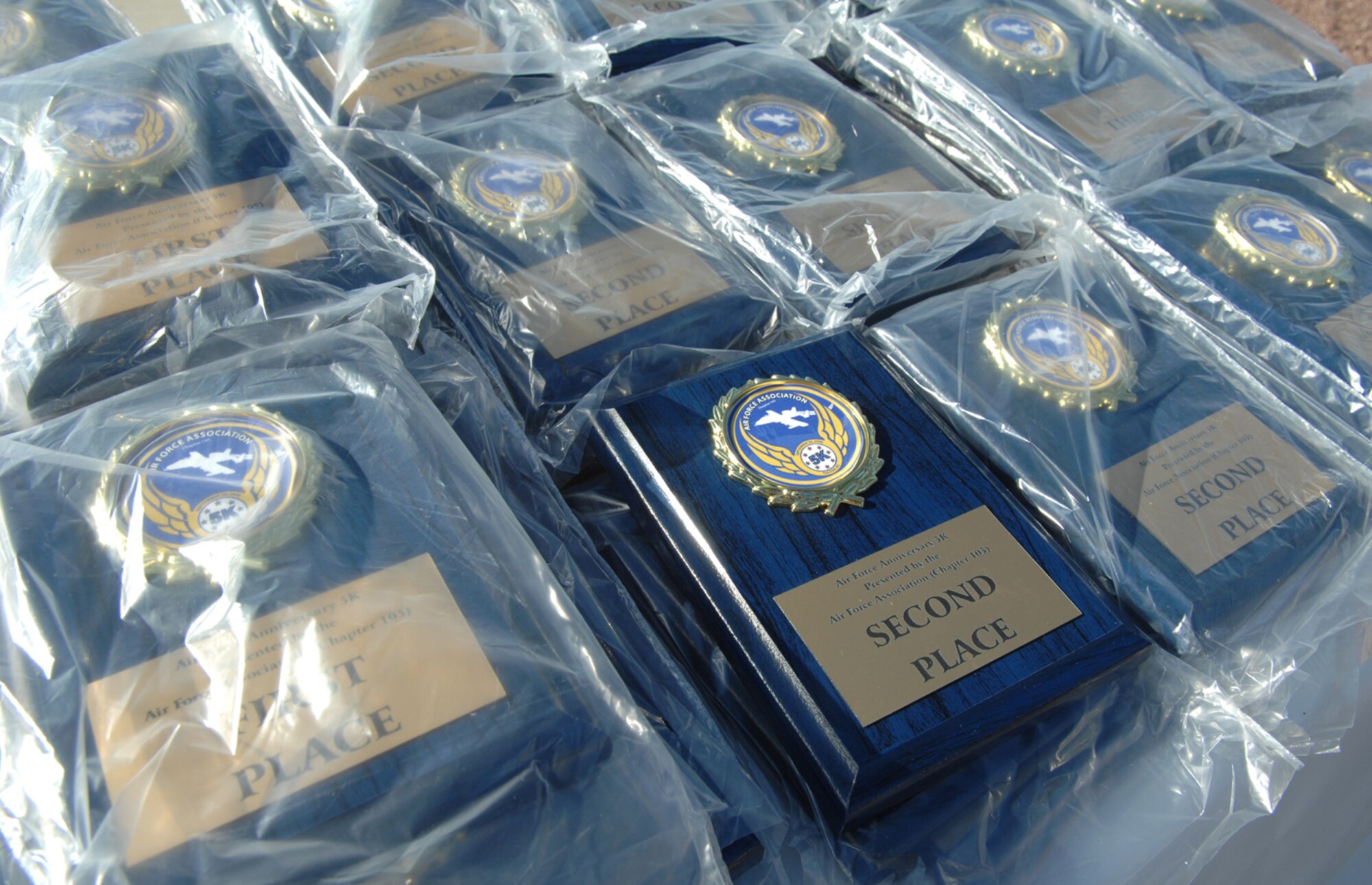 The Air Force Association held a 5K run Sept. 20 at the Pima Air and Space Museum to celebrate the Air Force's 61st birthday. The event, which was open to all age groups, kicked off at 7 a.m. Medallions were given to all finishers and trophies were given to the top finishers in each category. All proceeds went to the AFA. (U.S. Air Force photo by Staff Sgt. Valerie Smith)