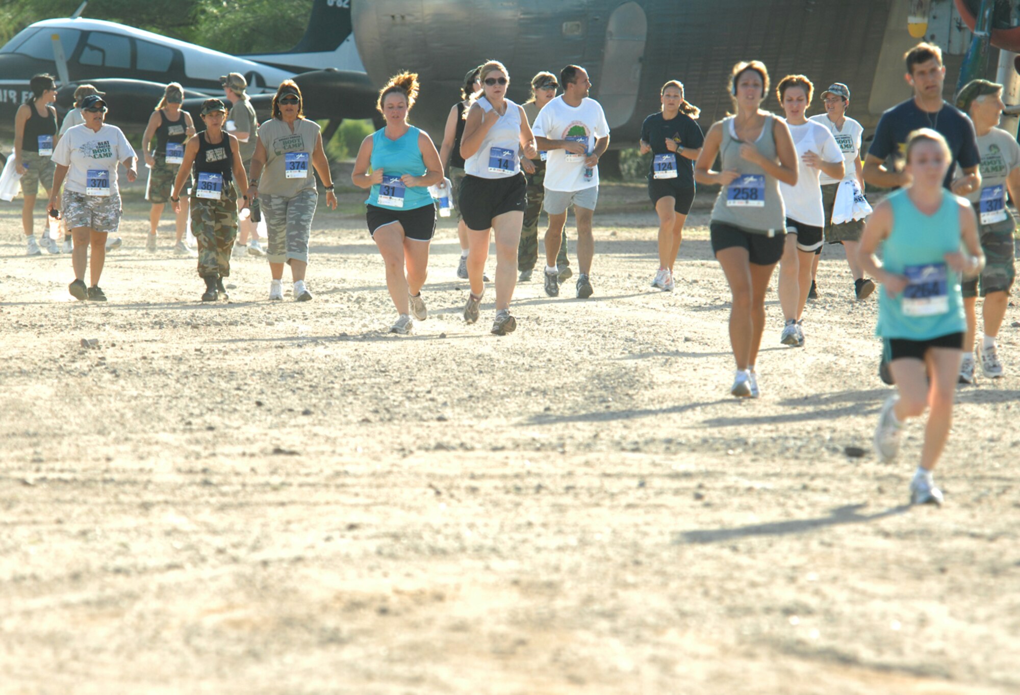 The Air Force Association held a 5K run Sept. 20 at the Pima Air and Space Museum to celebrate the Air Force's 61st birthday. The event, which was open to all age groups, kicked off at 7 a.m. Medallions were given to all finishers and trophies were given to the top finishers in each category. All proceeds went to the AFA. (U.S. Air Force photo by Staff Sgt. Valerie Smith)