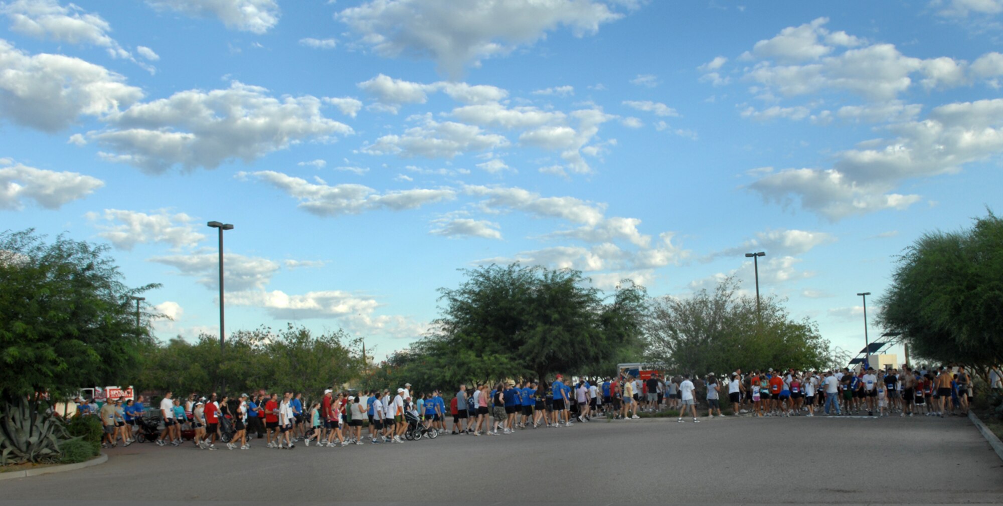 The Air Force Association held a 5K run Sept. 20 at the Pima Air and Space Museum to celebrate the Air Force's 61st birthday. The event, which was open to all age groups, kicked off at 7 a.m. Medallions were given to all finishers and trophies were given to the top finishers in each category. All proceeds went to the AFA. (U.S. Air Force photo by Staff Sgt. Valerie Smith)