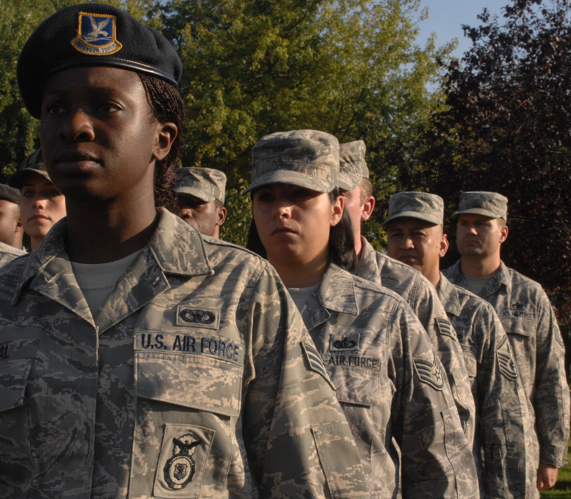 RAF Mildenhall Airmen stand in formation during RAF Mildenhall's POW/MIA Remembrance Week retreat ceremony Sept. 19, 2008. POW/MIA Remembrance Week is an all week observance for soldiers who were prisoners of war or missing in action. (U.S Air Force Photo by Airman First Class Brad Smith)
