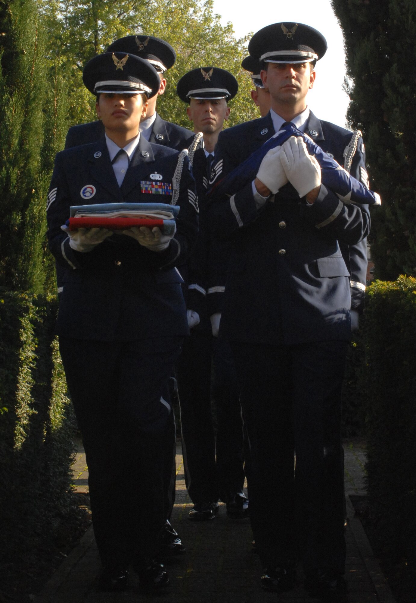 The RAF Mildenhall Honor Guard carries out the United States and Royal Air Force flags for the Prisoner of War, Missing in Action Remembrance Week retreat ceremony Sept. 19, 2008. POW/MIA Remembrance Week was a five-day observance paying tribute to soldiers who were prisoners of war or missing in action. (U.S Air Force Photo by Airman First Class Brad Smith)