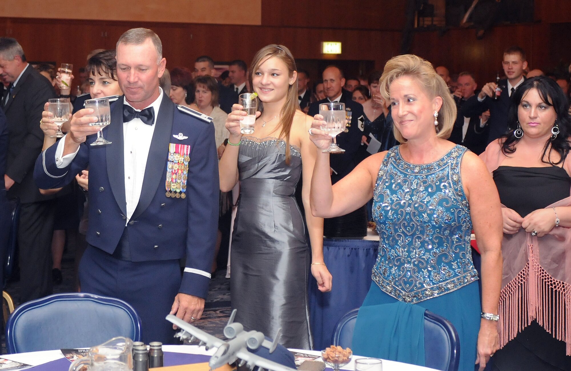 Col. Lee T. Wight, 52nd Fighter Wing commander, his daughter Shanna and Ann Wagner, U.S. Ambassador to Luxembourg, raise their glasses for a toast during the Air Force Ball held on Spangdahlem Air Base, Germany, Sept. 20, 2008. The 2008 Air Force Ball commemorates the Air Force’s 61st birthday. (U.S. Air Force photo by Master Sgt. Alexander Ray)